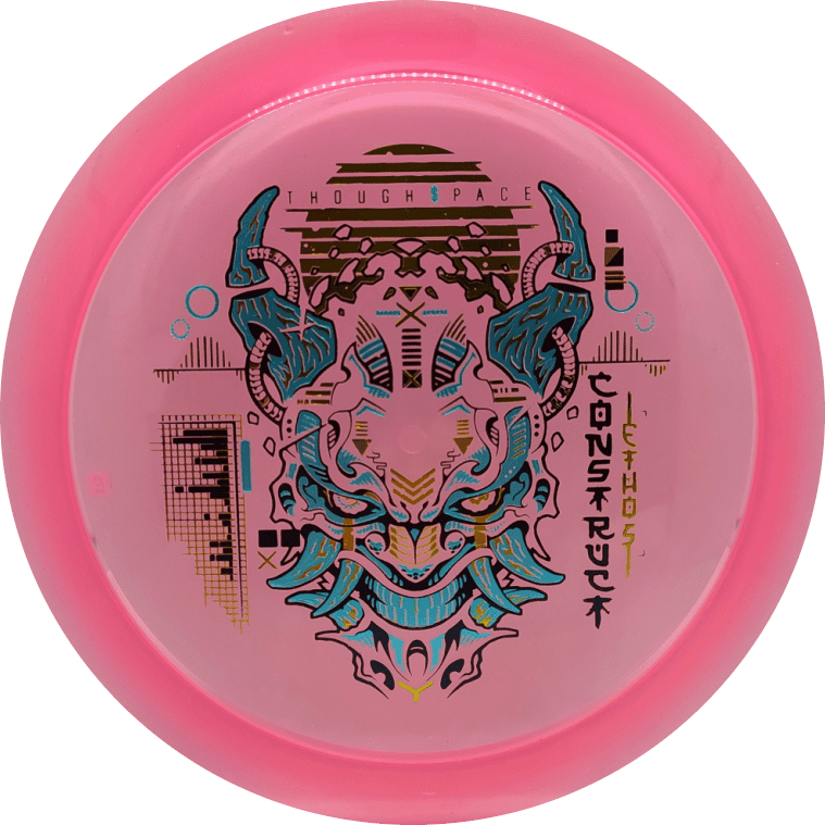 Colorful disc golf disc with intricate alien design and text.